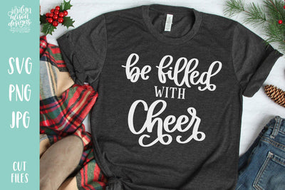 Grey T-Shirt with Handwritten text "Be Filled with Cheer" in white letters
