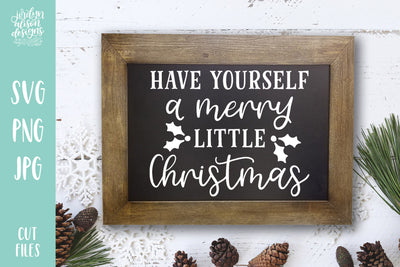 Rectangle chalkboard frame with handwritten text "Have Yourself a Merry Little Christmas"