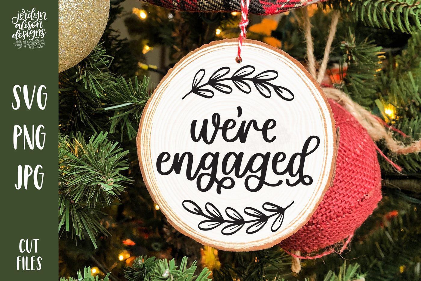Handwritten text "We're Engaged" on Round Christmas Ornament. 