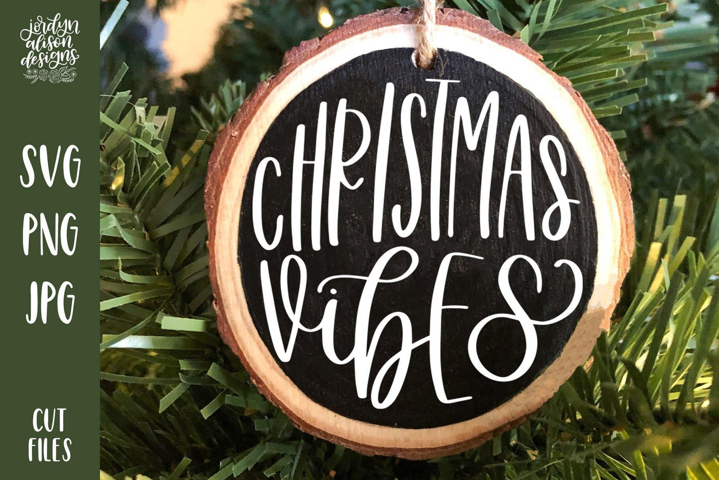 Handwritten text "Christmas Vibes" on Round Christmas Ornament. 