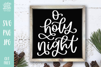Square frame with handwritten text "O Holy Night"